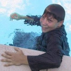 pool relay swimming in clothes